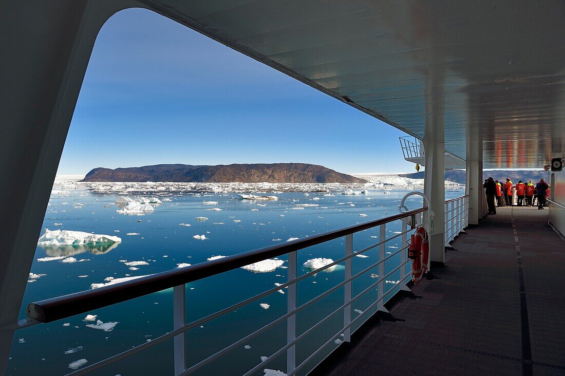 Greenland, west coast, Disko Bay, Hurtigruten's MS Fram Cruise Ship moves Between Icebergs in Quervain Bay, the Kangilerngata sermia on the left and the Eqip Sermia Glacier (Eqi Glacier) on the right