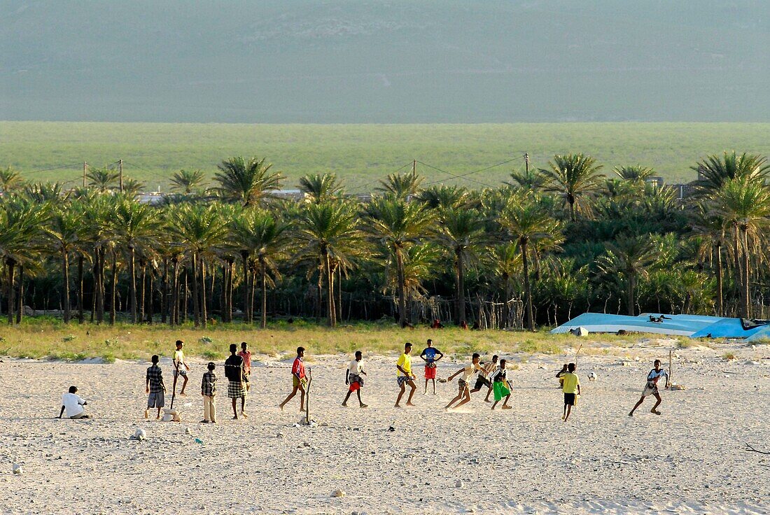 Yemen, Socotra Governorate, Socotra Island, listed as World Heritage by UNESCO, Qalansiyah, small fishing village, boys playing football