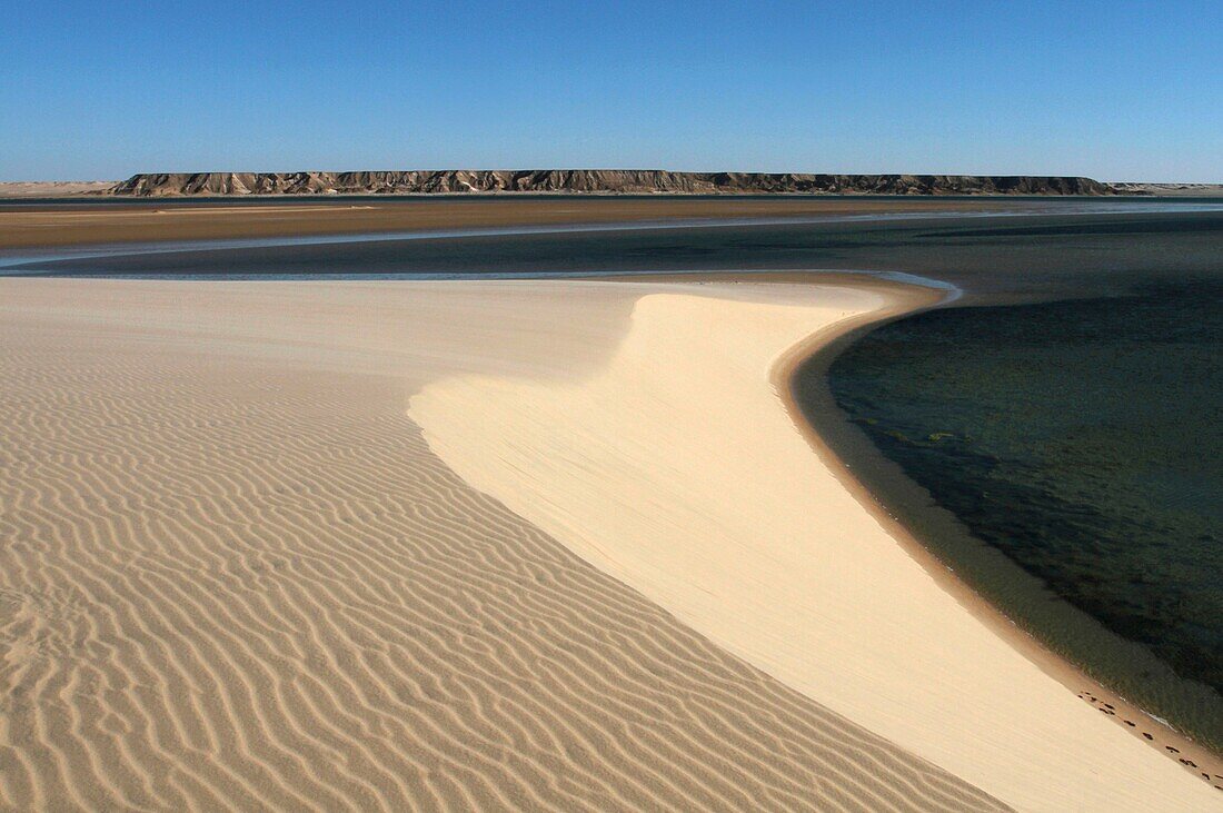 Morocco, Western Sahara, Dakhla, site of the white dune standing between lagoon and mountains