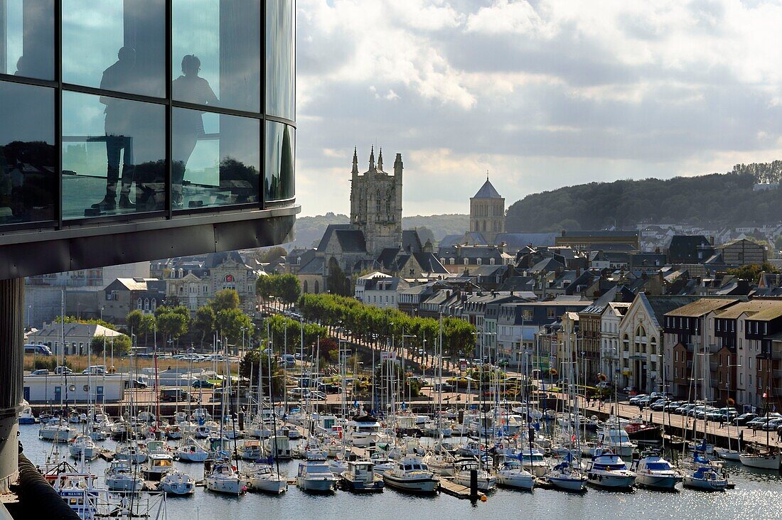 France, Seine Maritime, Pays de Caux, Cote d'Albatre, Fecamp, Les Pecheries (Fishery) - Museum of Fecamp is overlooking the port and St. Stephen's Church in the background