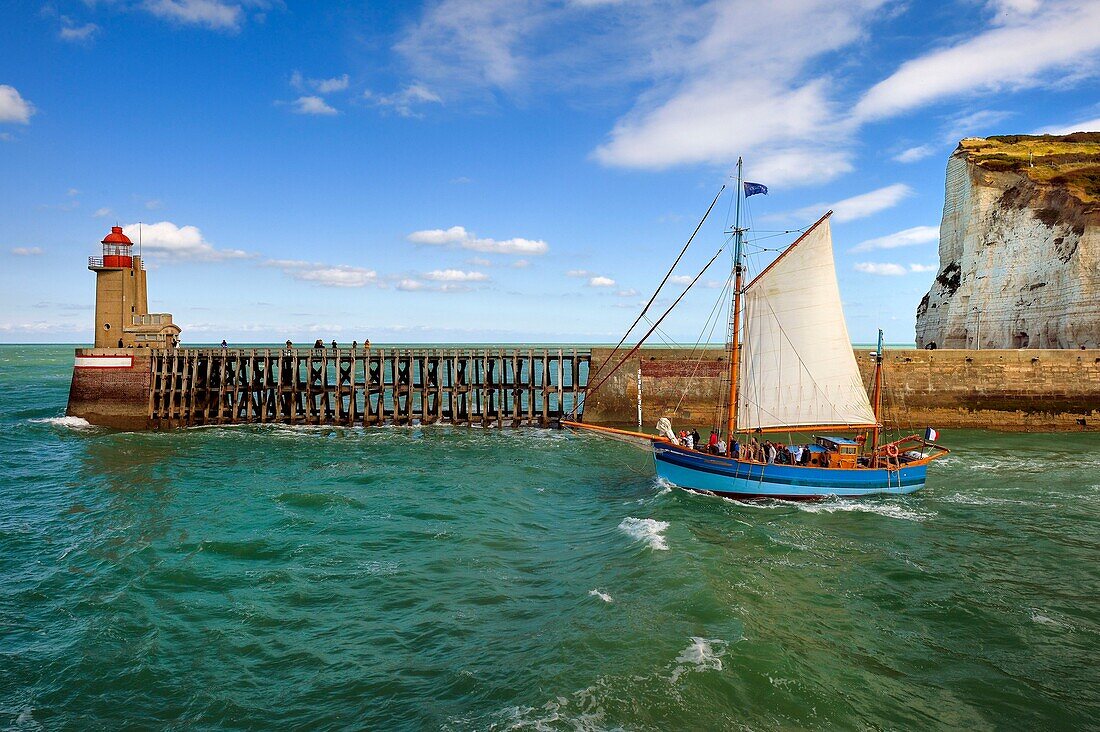 France, Seine Maritime, Pays de Caux, Cote d'Albatre, Fecamp, the old sailing ship Tante Fine leaves the port in front of the Pointe Fagnet lighthouse