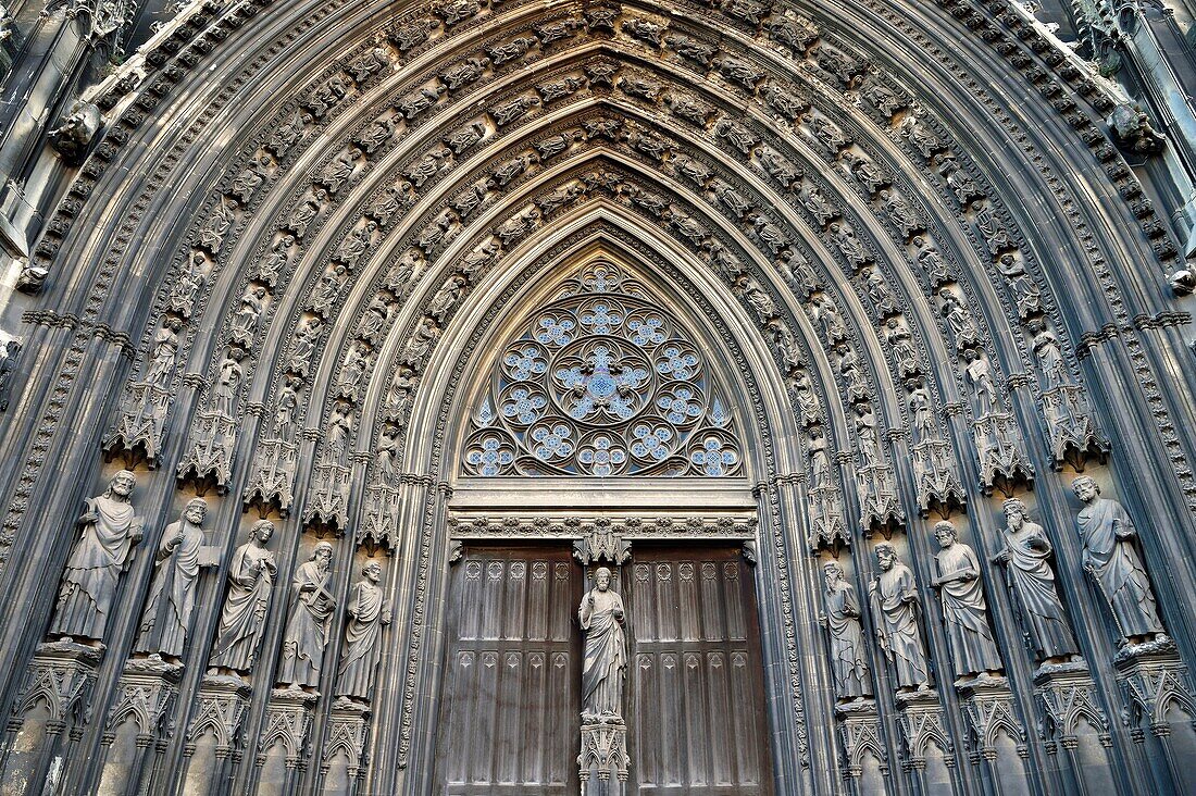 France, Seine Maritime, Rouen, Church of Saint Ouen (12th&#x2013;15th century), the central portal of the western facade, composed of Christ on the central pillar of the great door surrounded by the apostles