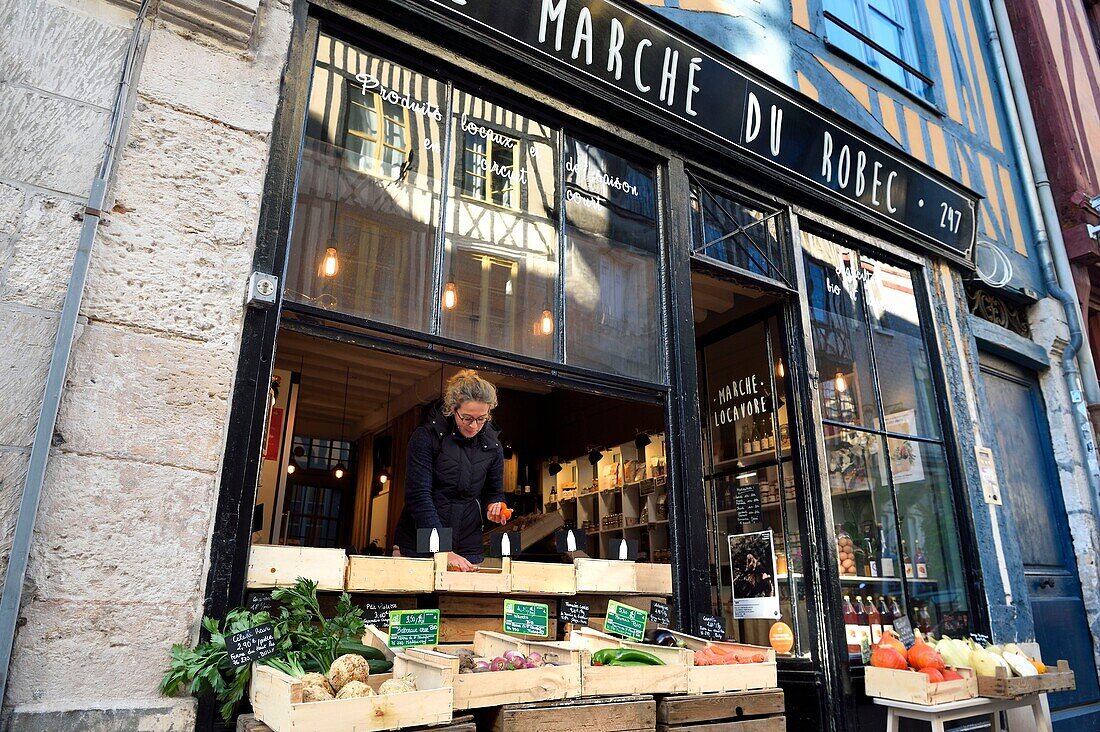 France, Seine-Maritime, Rouen, the Eau-de-Robec street, Victoire Lecourt in her fruit and vegetable shop Le Marché du Robec