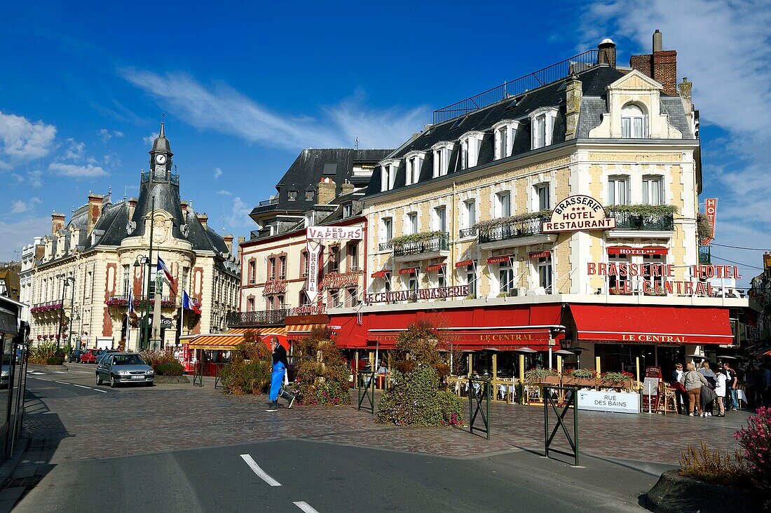 France, Calvados, Pays d'Auge, Trouville sur Mer, Le Central and Les Vapeurs restaurant, the moule frites (mussels and fries) are their specialty, the town hall in the background