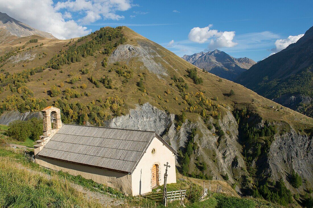 France, Hautes Alpes, The massive Grave of Oisans, the chapel of the hamlet of the hières and the setting of the spines