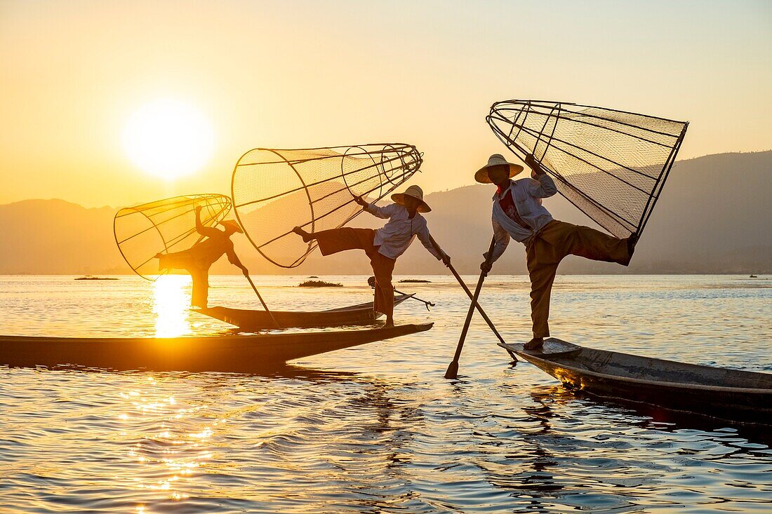 Myanmar (Burma), Shan State, Inle Lake, Intha fishermen with their conical net