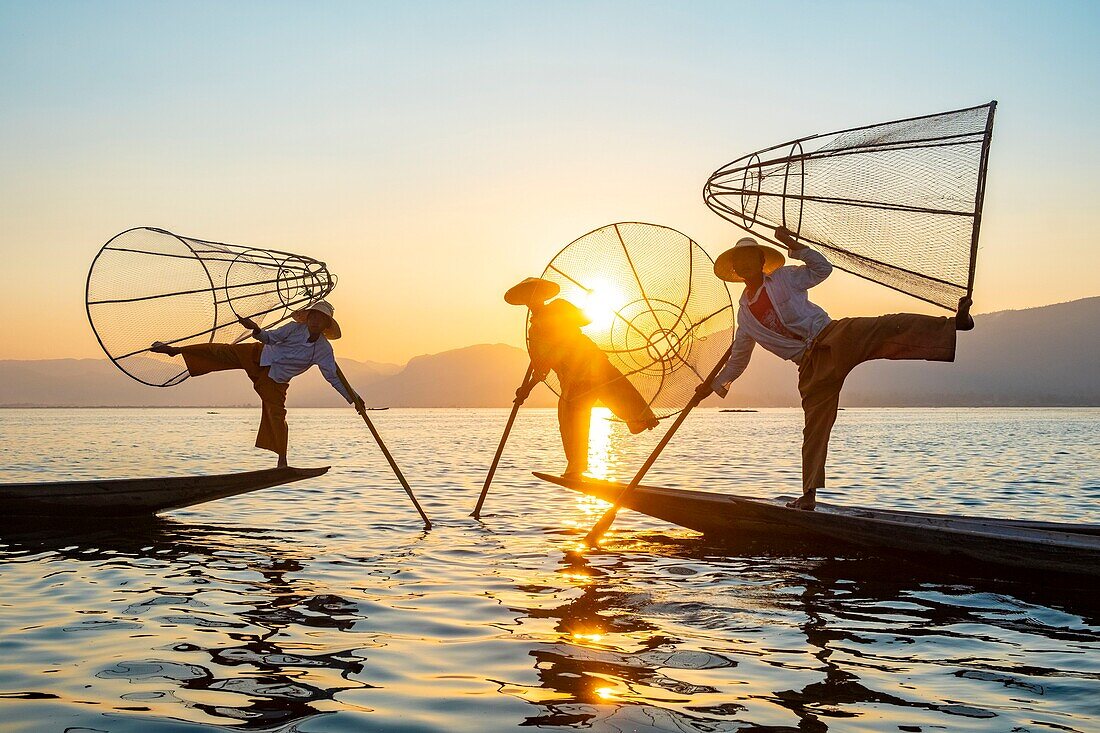 Myanmar (Burma), Shan State, Inle Lake, Intha fishermen with their conical net