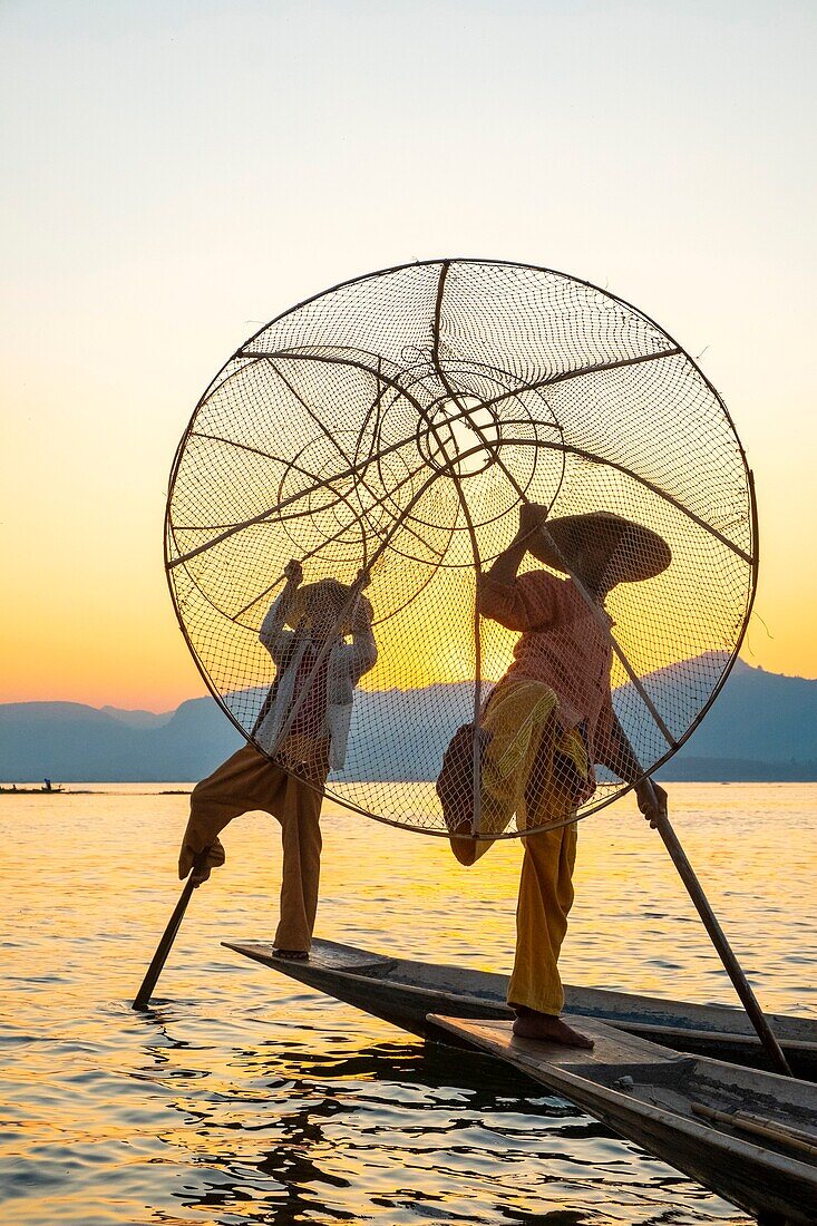 Myanmar (Burma), Shan State, Inle Lake, Intha fishermen with their conical net