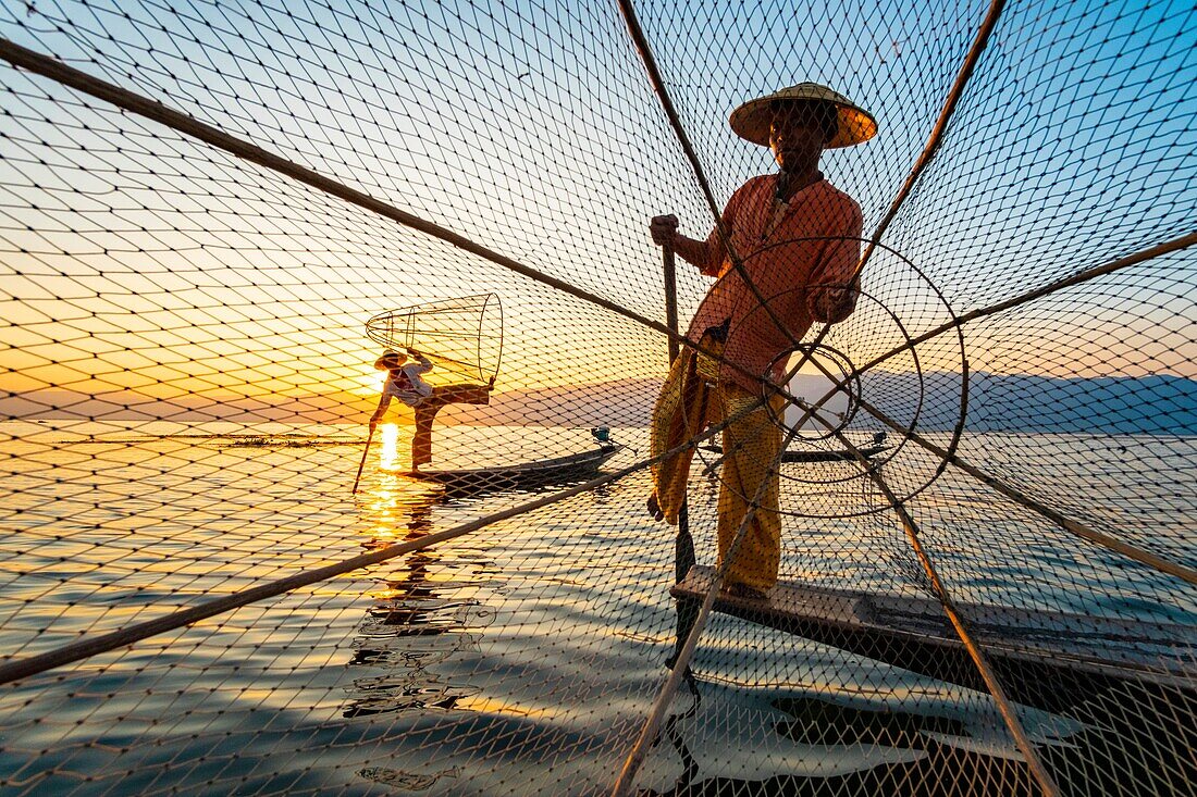 Myanmar (Burma), Shan State, Inle Lake, Intha fishermen with their conical net