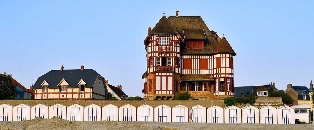 France, Somme, Baie de Somme, Le Crotoy, Belle-Epoque villa and beach cabines along Jules-Noiret promenade