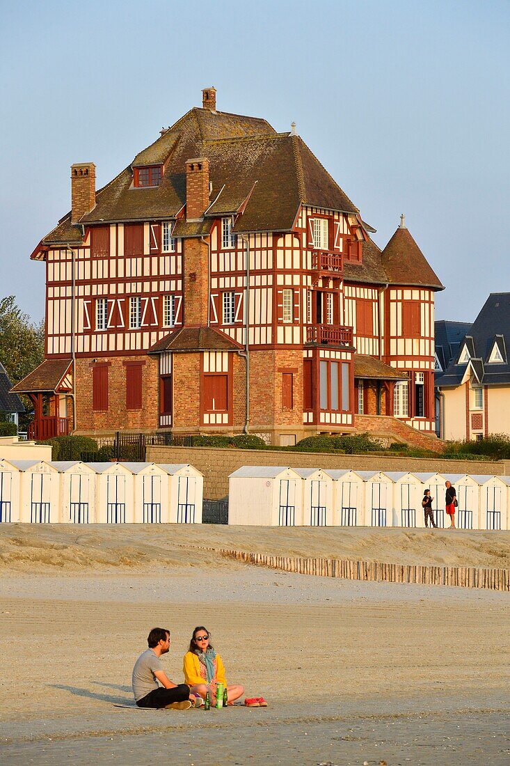 France, Somme, Baie de Somme, Le Crotoy, Belle-Epoque villa and beach cabines along Jules-Noiret promenade