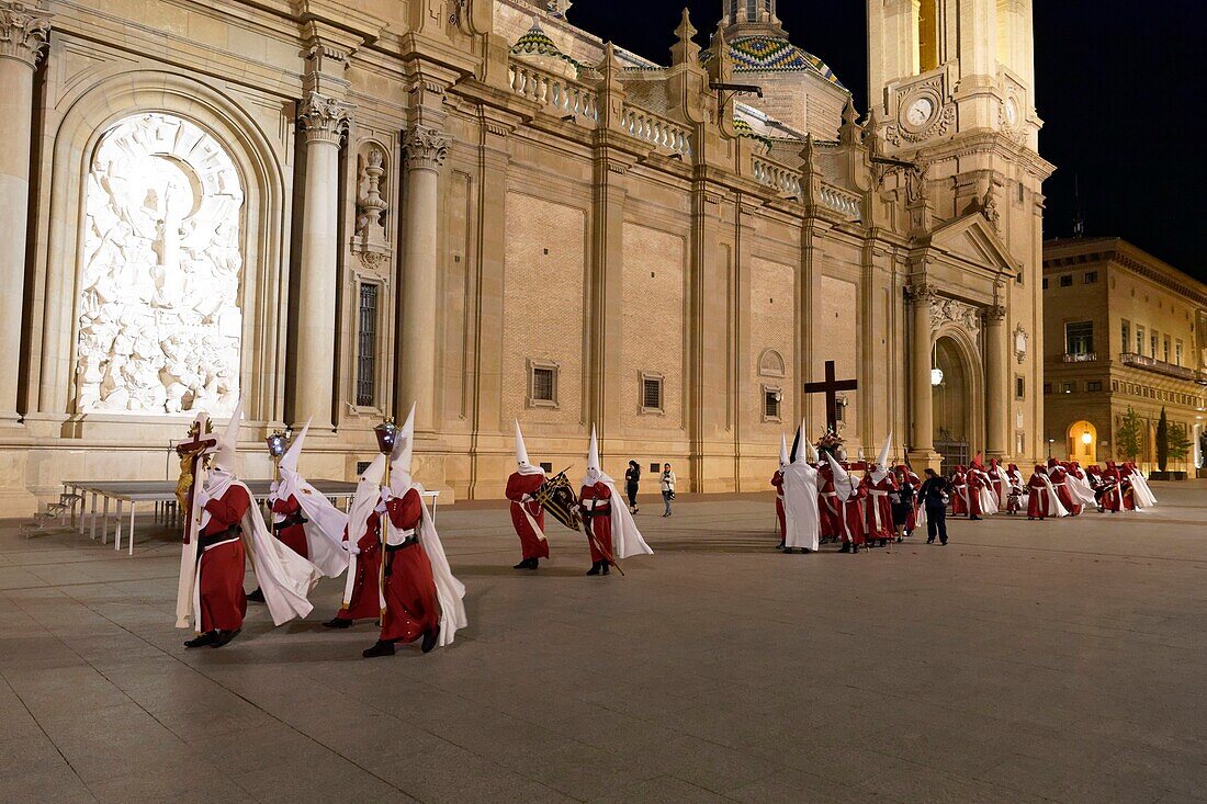 Spain, Aragon Region, Zaragoza Province, Zaragoza, Semana Santa (Holy Week) celebrations, Basilica de Nuestra Senora de Pilar in the background