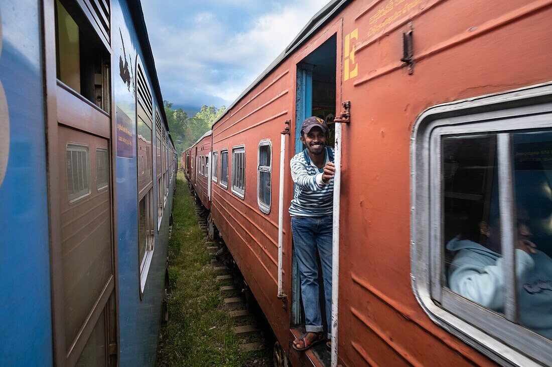 Sri Lanka, Uva province, the train line that connects Badulla to Kandy crossing mountain regions and tea plantations