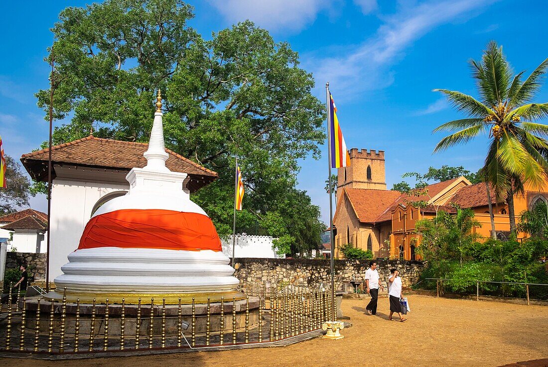 Sri Lanka, Central province, Kandy, a World Heritage Site, Buddhist stupa or dagoba and St. Paul's Anglican Church in the royal palace complex