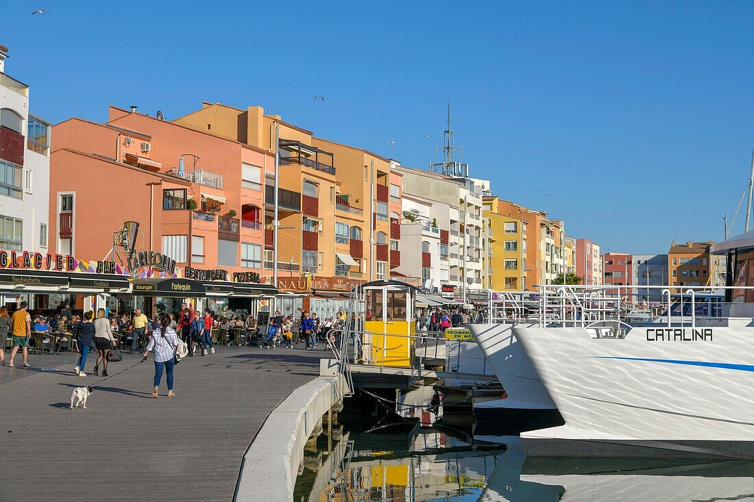 France, Herault, Agde, Cape of Agde, the Marina, walkers on a wharf