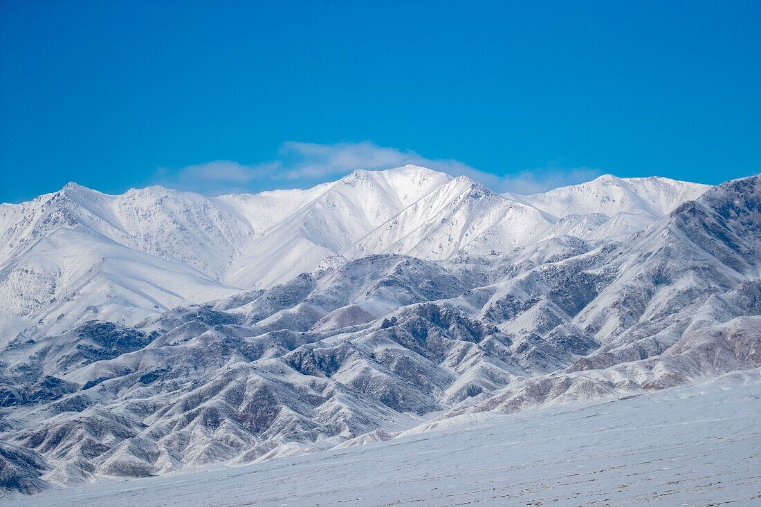 Mongolia, West Mongolia, Altai mountains, Valley with snow and rocks