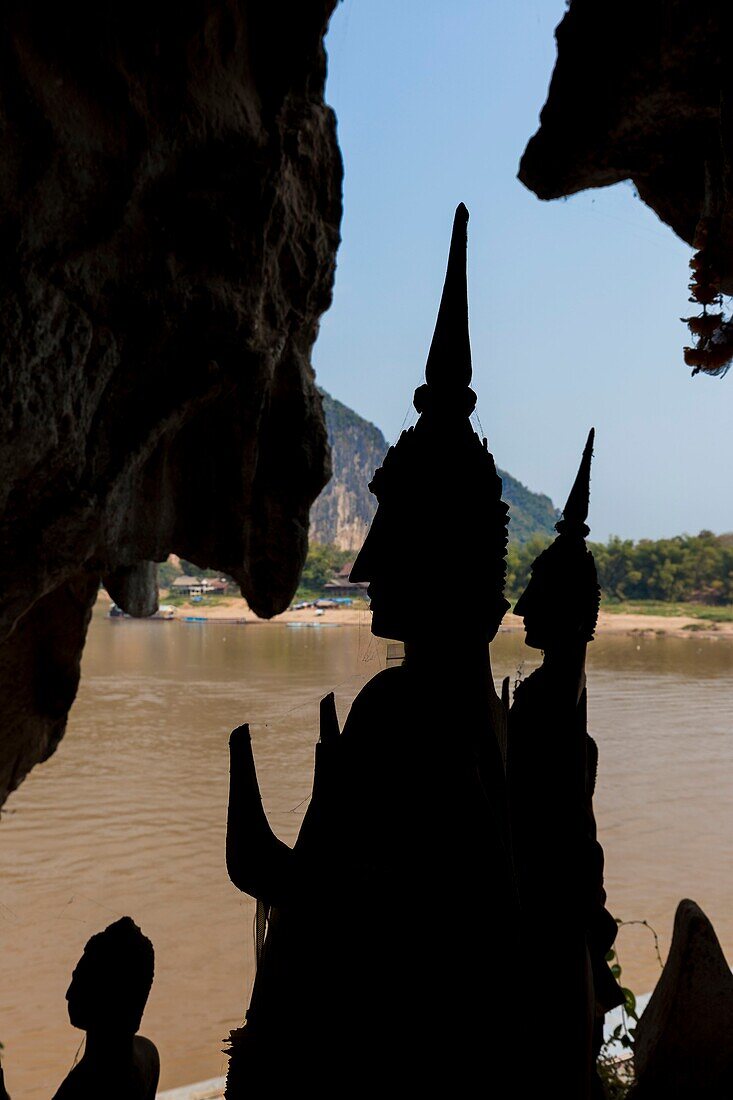 Laos, Luang Prabang province, Mekong River, Pak Ou Cave, rows of Buddha statues