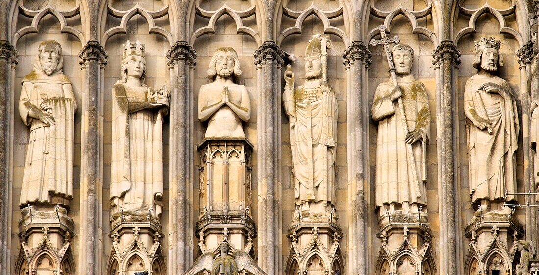 France, Marne, Reims, Notre Dame de Reims cathedral, listed as World Heritage by UNESCO, the western façade, Baptism of Clovis (center) by the Bishop Saint Remi, in the presence of Clotilde, his wife and inspiration of his conversion, the Bishop assistants and of the hermit Montan