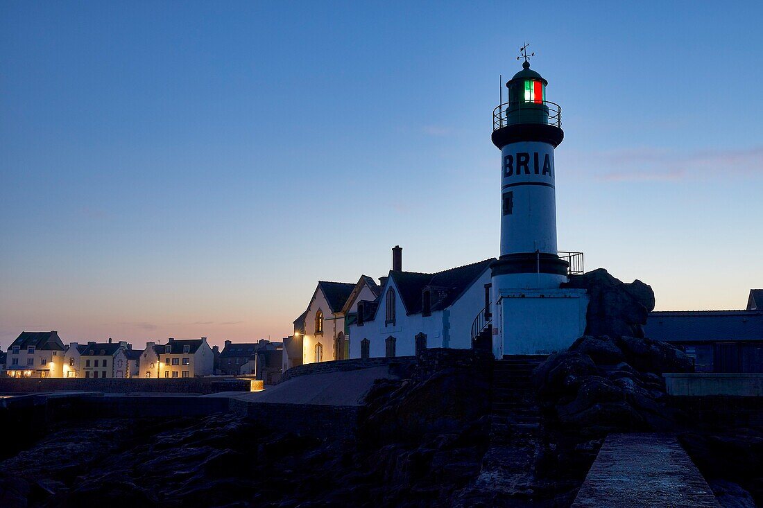 France, Finistere, Iroise Sea, Iles du Ponant, Parc Naturel Regional d'Armorique (Armorica Regional Natural Park), Ile de Sein, labelled Les Plus Beaux de France (The Most Beautiful Village of France), the Men-Brial lighthouse at nightfall