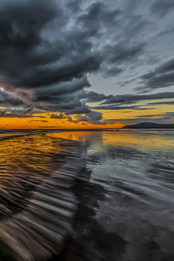 Sunset from Sandy Gap on Walney Island, view towards the distant Black Combe across the Irish Sea, Duddon Estuary and Cumbrian Coast , Cumbria, England, United Kingdom, Europe