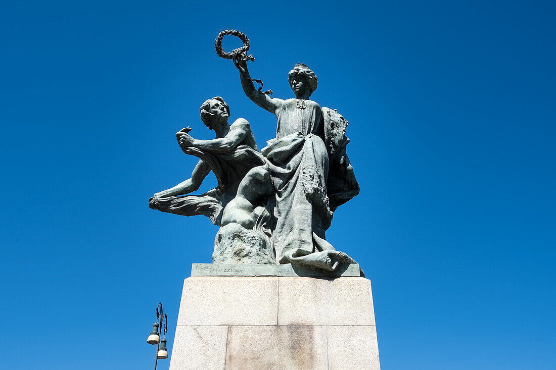 Architectural detail of statues adorning the Umberto I Bridge, spanning the Po River, Turin, Piedmont, Italy, Europe