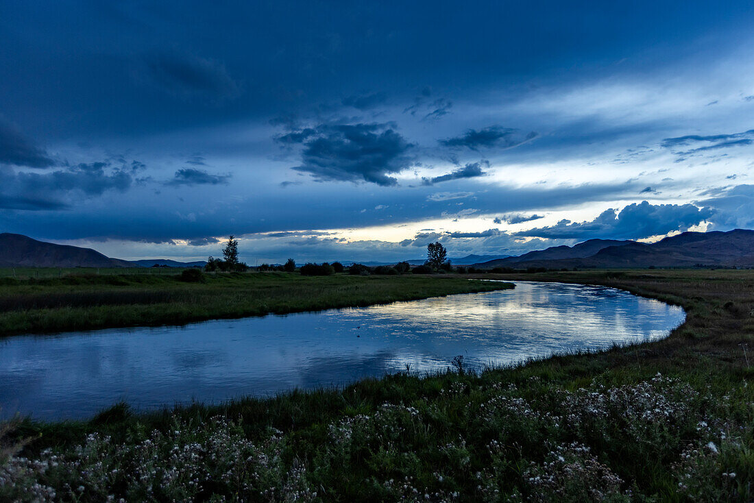 Reflection of evening storm in Silver Creek