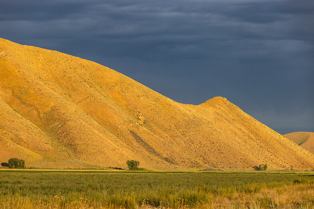 USA, Idaho, Bellevue, Hills illuminated with afternoon sunlight