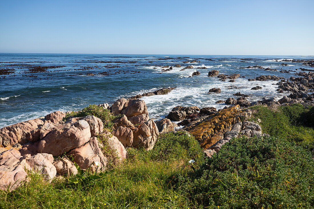 South Africa, Onrus, Onrus Beach, Rocky coast and Onrus Beach at sunny day