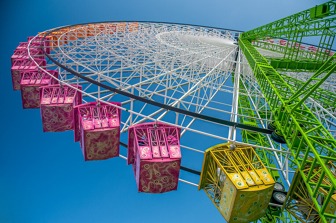 Giant Ferris Wheel Against Blue Sky
