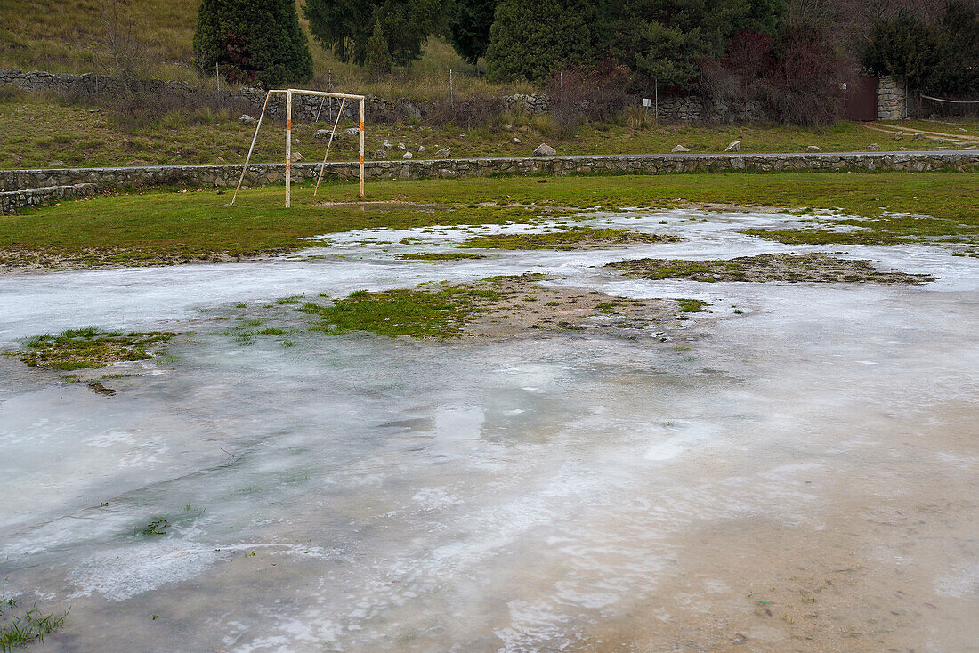 Football goal and ice