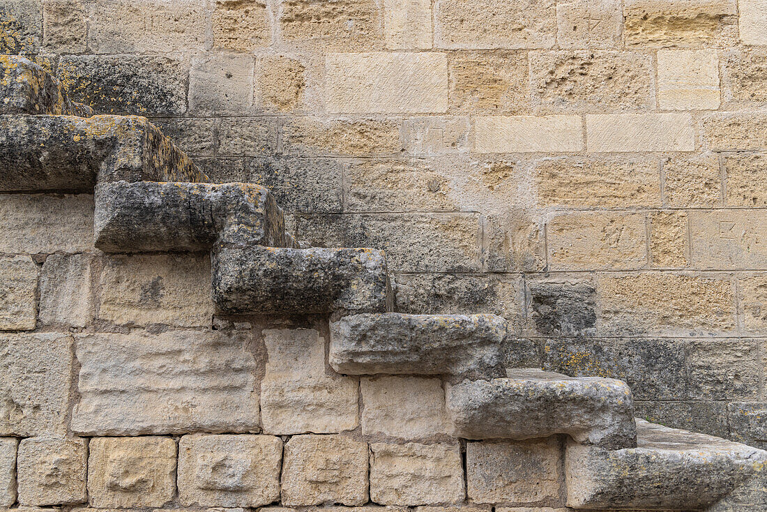 Aigues-Mortes, Gard, Occitania, France. Stone steps on the old city wall of Aigues-Mortes.