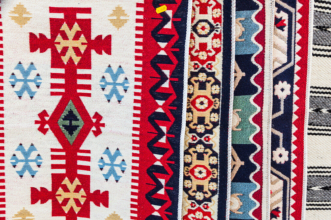 Romania. Traditional textile, woven designs on cloth.