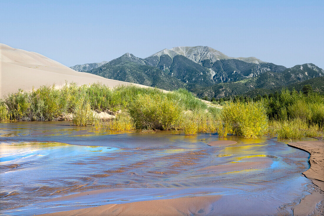 USA, Colorado. Great Sand Dunes National Park. Sangre De Cristo Mountains and Medano Creek.