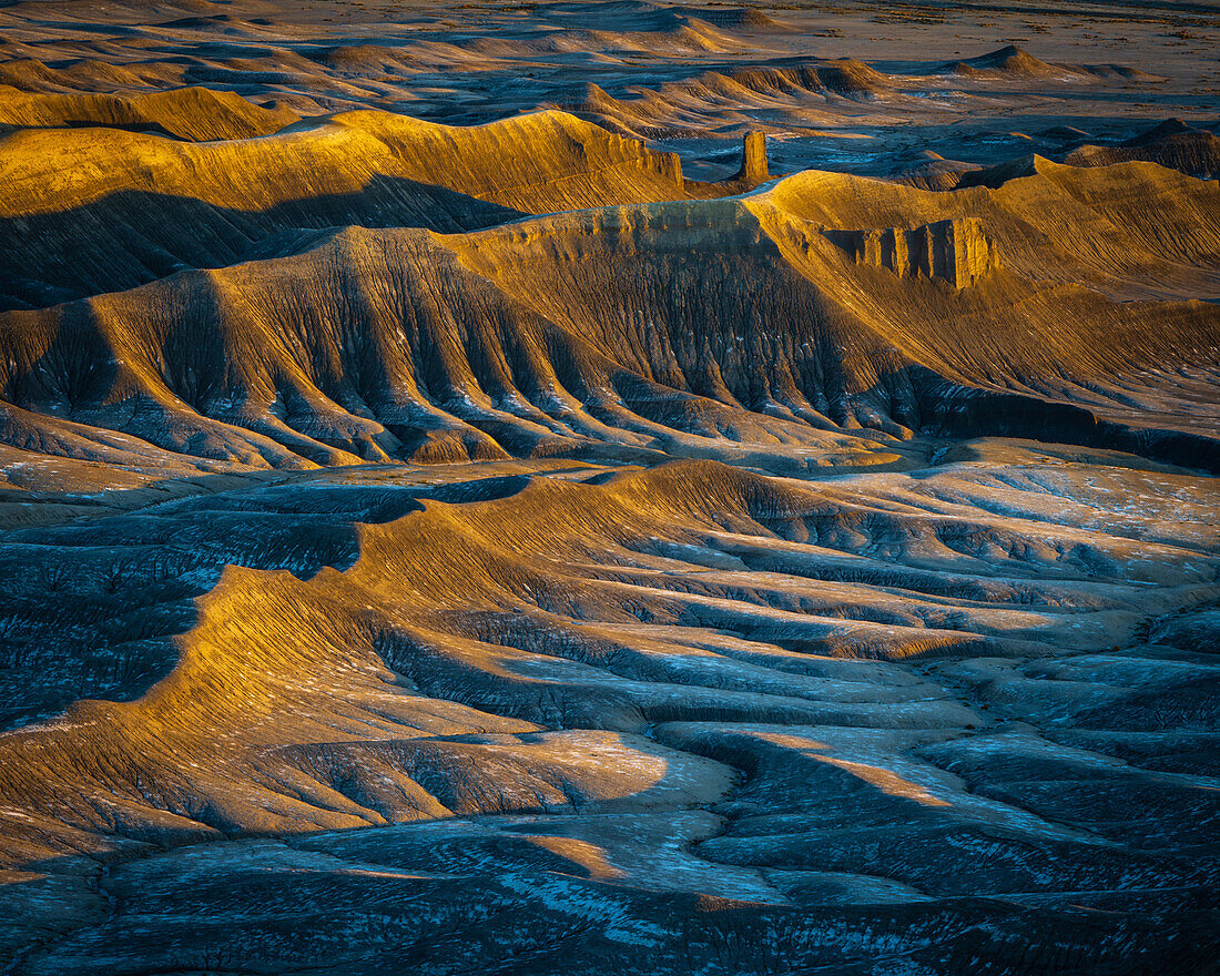 USA, Utah, Capital Reef National Park. Sunrise on mountain badlands.