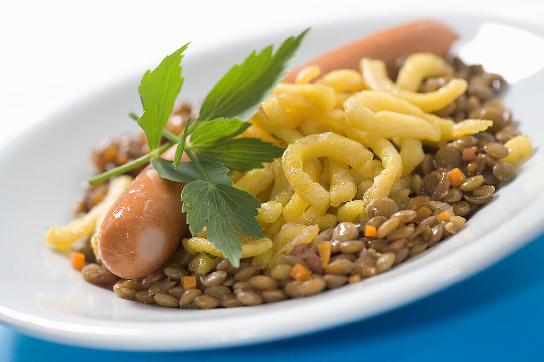 Spaetzle on lentils with Viennese sausages