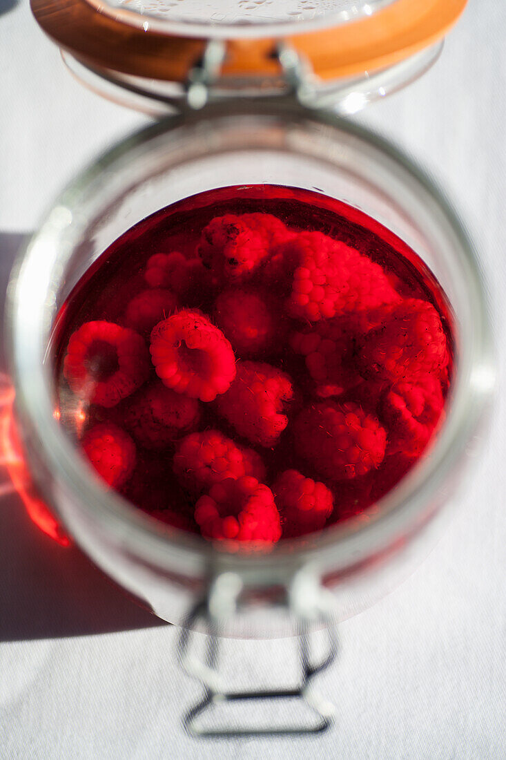 Raspberry schnapps with fresh raspberries