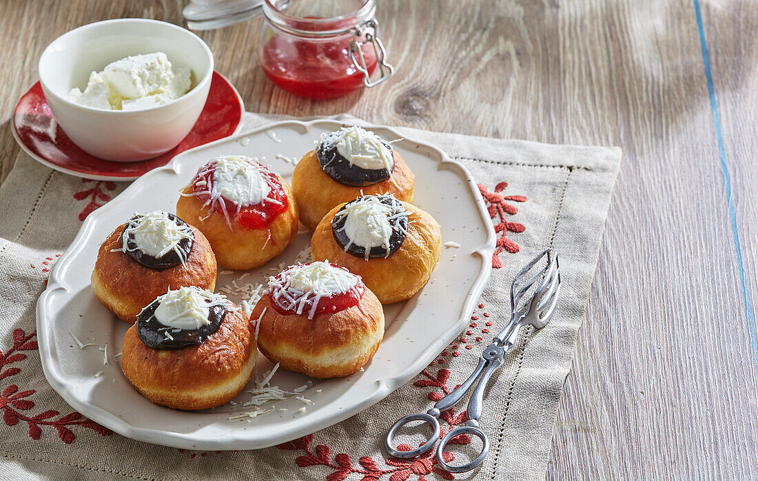 Doughnuts with plum jam, marmalade and quark cream