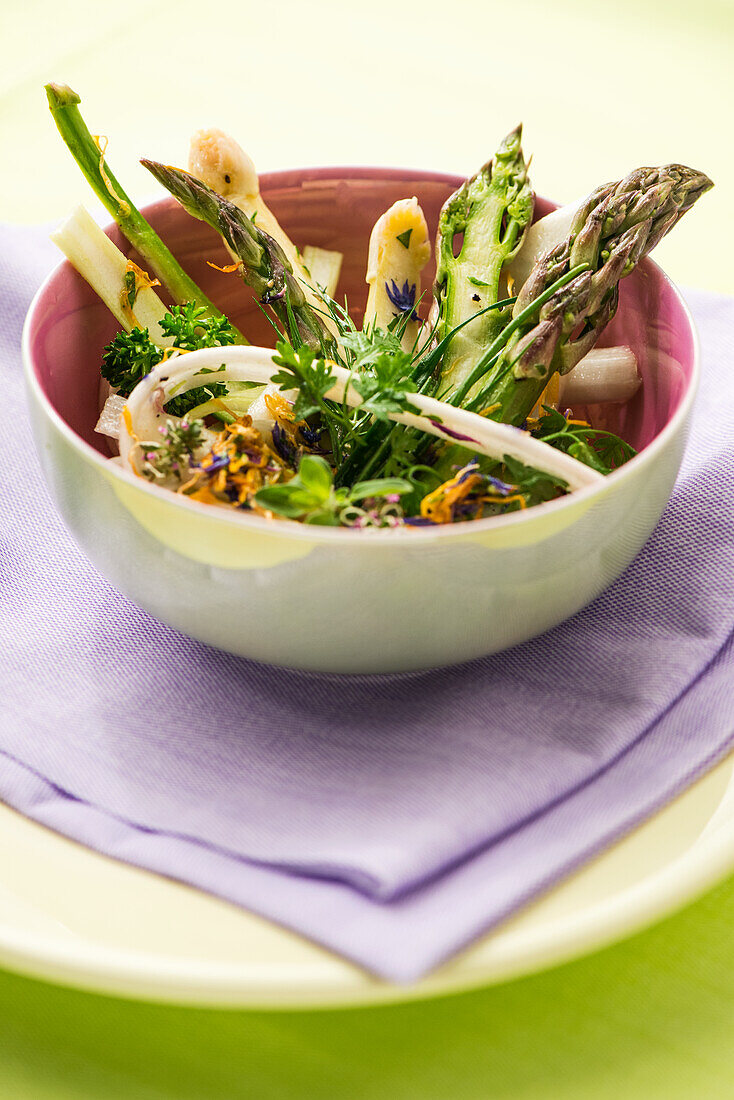 Salad of raw white and green asparagus