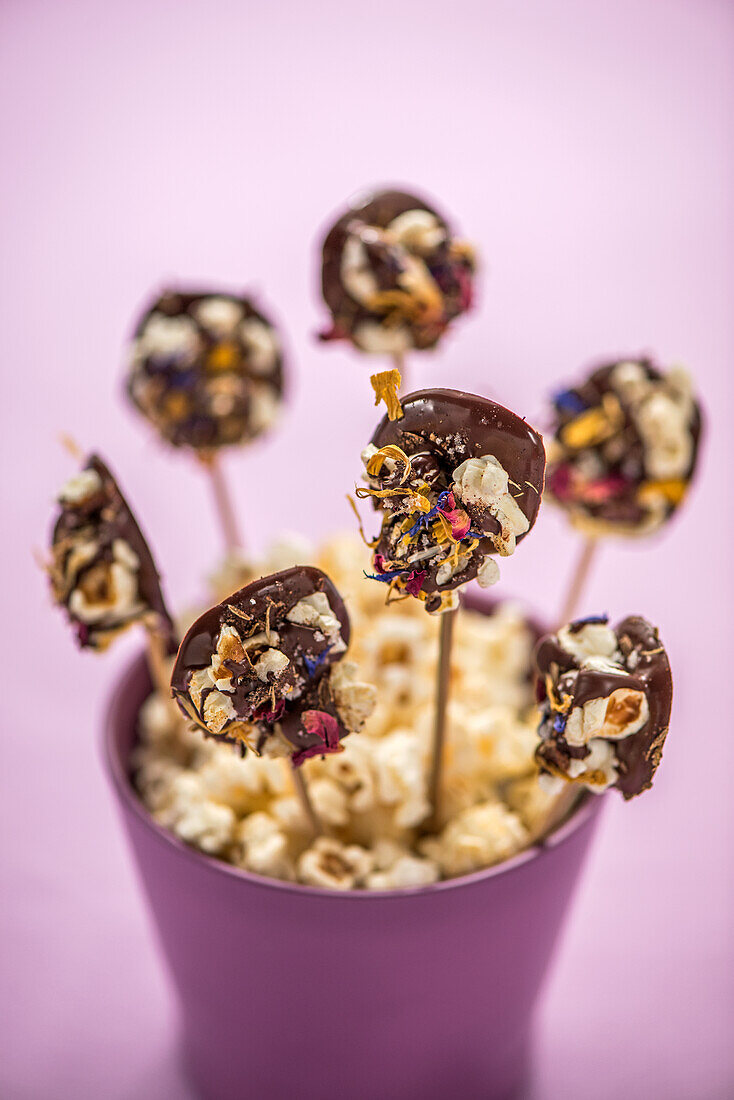 Spiced chocolate popcorn lollipops