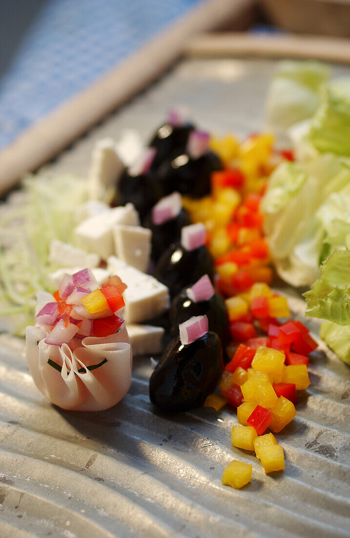 Sheep's cheese with olives and peppers