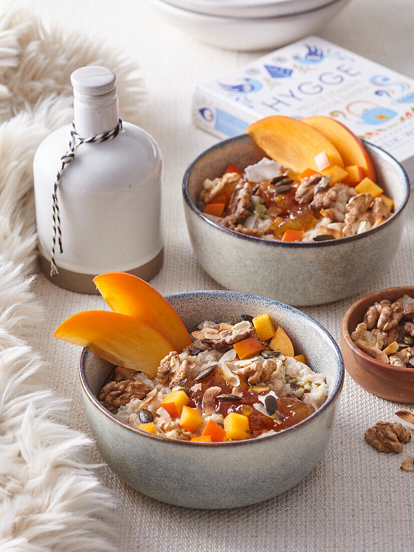 Porridge with persimmon, nuts and pumpkin seed oil