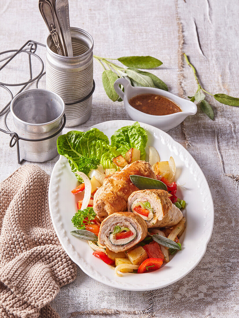 Stuffed pork roulades with vegetables