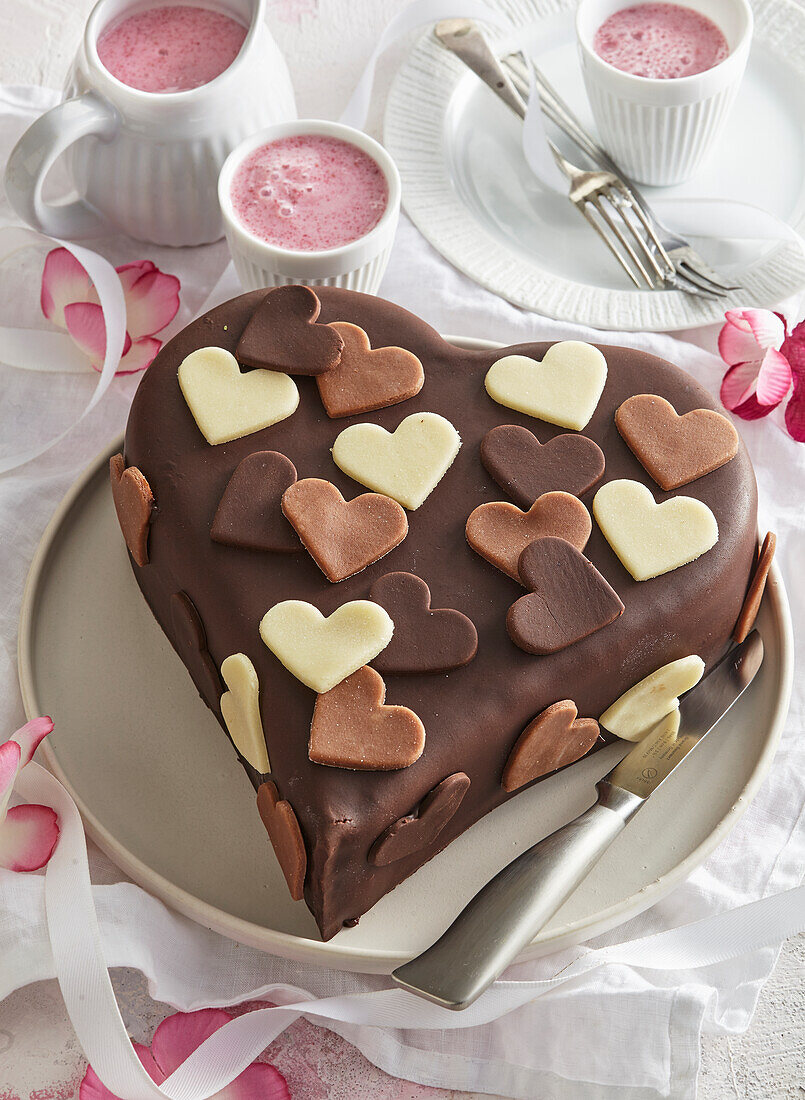 Heart-shaped cake with marzipan hearts