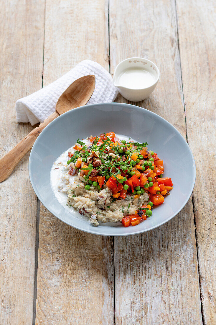 Vegetable porridge with peas and peppers