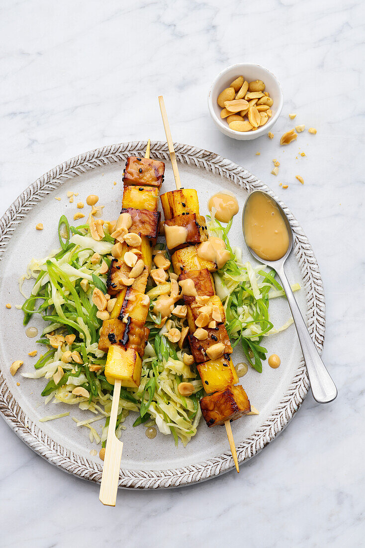 Tofu and pineapple skewers with peanut sauce