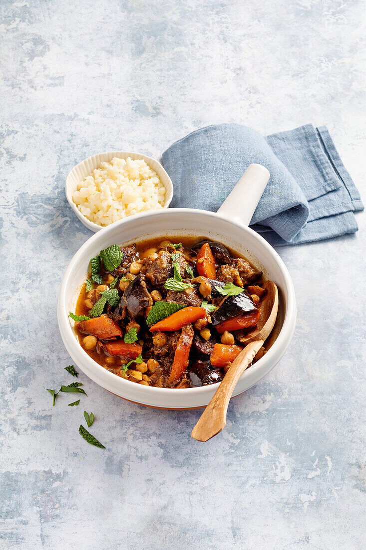 Beef tajine with vegetables and couscous