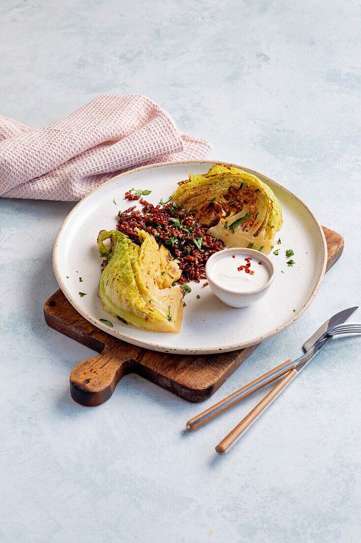 Savoy cabbage wedges with quinoa and yoghurt dip