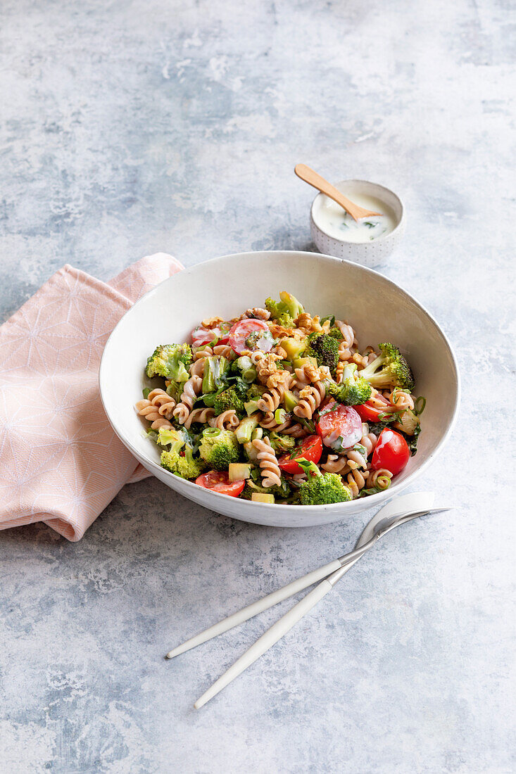 Pasta salad with broccoli and tomatoes