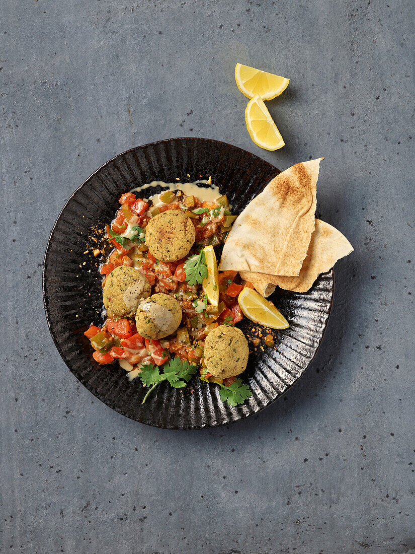 Falafel with hummus, salad and pita