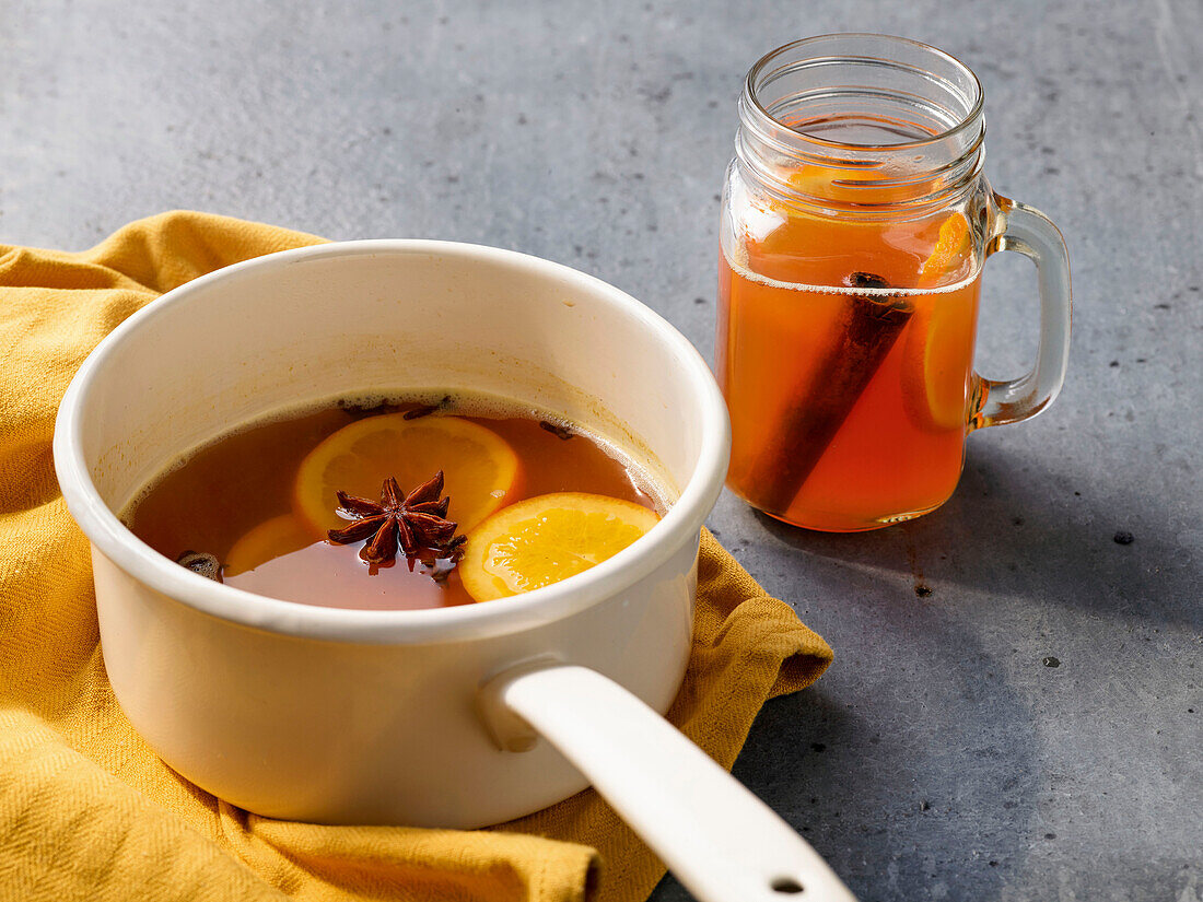 Warm children's punch with orange and cinnamon